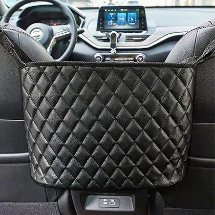 Imaginea din Organizator auto între scaunele din față