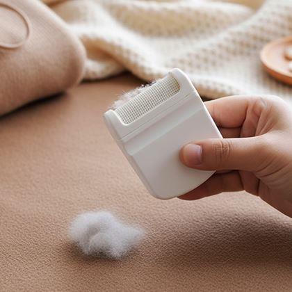 Imaginea din Îndepărtător de scame