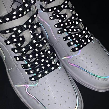 Imaginea din Ţeşi cu stele reflectorizante  -  negre