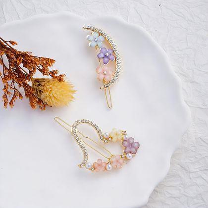 Imaginea din Alegeți florale cu pietricele pentru păr 4 bucăți