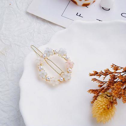 Imaginea din Alegeți florale cu pietricele pentru păr 4 bucăți