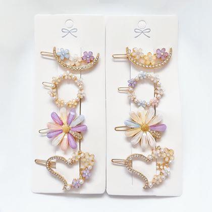 Imaginea din Alegeți florale cu pietricele pentru păr 4 bucăți