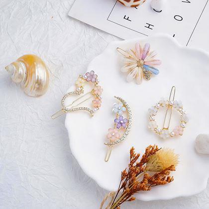 Imaginea din Alegeți florale cu pietricele pentru păr 4 bucăți