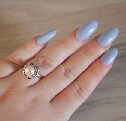 Imaginea din Perla dorinței în scoică cu colier, cercei și inel