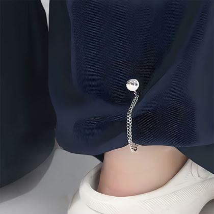 Imaginea din Clema magnetică pentru scurtarea pantalonilor cu lanț – argintie