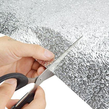 Imaginea din Folie autoadezivă din aluminiu 300 x 40 cm împotriva grăsimii, apei și zgârieturilor