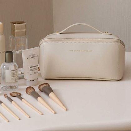 Imaginea din Geantă cosmetică cu compartimente  -  crem